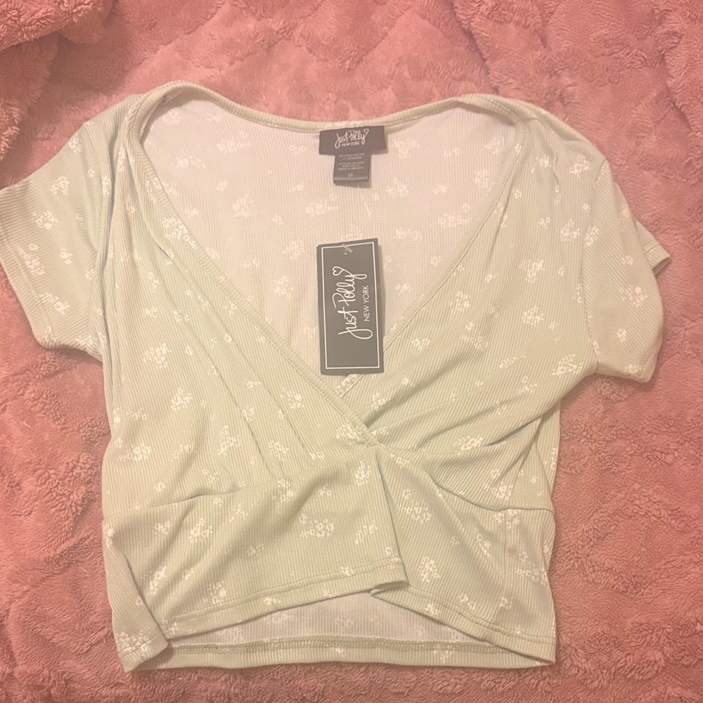green and white floral top